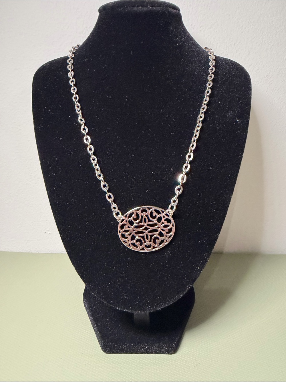 Lia Sophia Elegant Silver Openwork Oval Pendant Necklace - Women's Jewelry